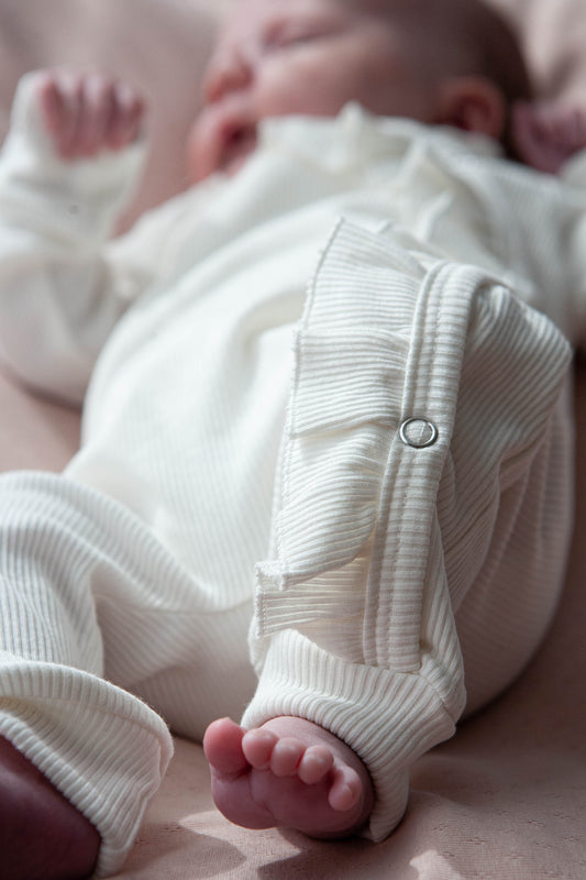 Baby romper ribbed ruffle ecru